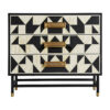 Cómoda senj de estilo art deco fabricado en hierro en color negro combinado con hueso en color blanco.