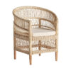 Sillón elna de estilo contemporáneo fabricado en ratán en color marrón combinado con madera mindi y algodón. Producto desenfundable.