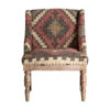 Sillón rakek de estilo colonial fabricado en madera de mango en color marrón con acabado estampado combinado con madera de pino y yute.