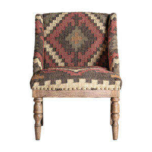 Sillón rakek de estilo colonial fabricado en madera de mango en color marrón con acabado estampado combinado con madera de pino y yute.