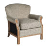 Sillón Laronxe de estilo colonial fabricado en poliéster en color gris combinado con madera de fresno.
