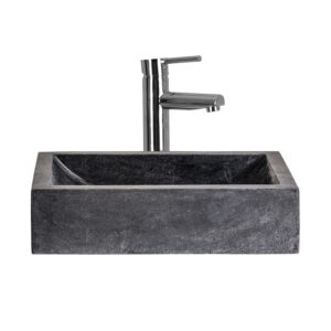 Lavabo Haumea de estilo colonial fabricado en piedra en color negro.
