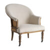 Sillón Ault de estilo clásico fabricado en madera de fresno en color marrón combinado con loneta en color beige y yute.