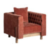 Sillón carlton de estilo art deco fabricado en poliéster en color burdeos combinado con madera de pino en color marrón y espuma. Producto desenfundable.