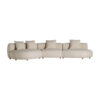 Sofá modular zakupi de estilo contemporáneo fabricado en poliéster en color beige combinado con madera de caucho y madera contrachapada.