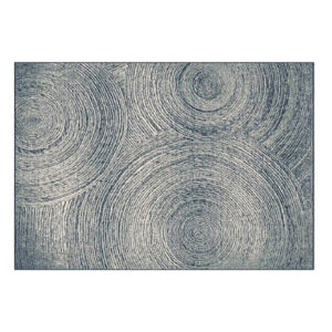 Alfombra bakea de estilo colonial fabricado en viscosa en color tonos de azul combinado con poliéster.