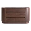 Cómoda Stuetta de estilo contemporáneo fabricado en madera contrachapada en color marrón combinado con chapa de roble y piedra sinterizada en color blanco con acabado veteado.