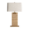 Lámpara de sobremesa de estilo art deco fabricado en travertino en color marrón combinado con hierro en color oro y algodón bouclé en color blanco roto. Producto desmontable.