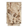 Mesa auxiliar grov de estilo art deco fabricado en mármol en color beige.