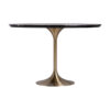 Mesa comedor Kelheim de estilo art deco fabricado en porcelánico en color negro combinado con acero en color oro. Producto desmontable.