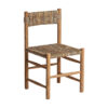 Silla manhula de estilo colonial fabricado en madera de teka en color marrón combinado con fibra natural.