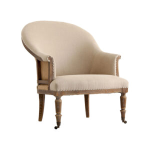 Sillón Ault de estilo clásico fabricado en madera de fresno en color arena con acabado envejecido combinado con loneta y yute.
