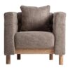 Sillón Carlton de estilo colonial fabricado en poliéster en color beige con acabado jaspeado combinado con madera de pino en color marrón claro y espuma.