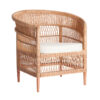 Sillón Elna de estilo contemporáneo fabricado en ratán en color marrón combinado con algodón y espuma. Producto desenfundable.