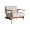 Sillón Habouey de estilo art deco fabricado en poliéster en color beige con acabado jaspeado combinado con madera de pino en color marrón y acero en color oro.