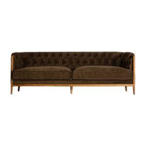 Sofá Velburg de estilo colonial fabricado en acrílico en color verde combinado con madera de caucho. Producto desenfundable.